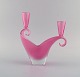 Two-armed Murano candle holder in pink hand-blown art glass. Italian design, 
1960s.
