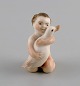 Rare Royal Copenhagen porcelain figure. Girl with duck. Model number 2332.
