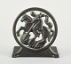 Just Andersen, Denmark. Art deco bookend in disco metal with Saint George and 
the dragon. The 1940s. Model number 1626.