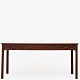 Roxy Klassik presents: Danish CabinetmakerDesk in mahogany with profiled legs and edges. Brass handles and ...
