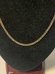 Armor necklace in 14 carat gold
Stamped 585
Length 56 cm approx
Width 3.09 mm approx
Thickness 1.23 mm approx