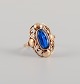 14 carat gold ring adorned with blue semi-precious stones, Danish goldsmith, 
approx. 1950s.
