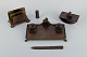 GAB Sweden, a writing set in bronze consisting of an inkwell, letter knife, 
letter holder, seal and inkwell.