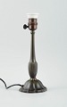 Just Andersen, table lamp in disco metal.
Model D56.