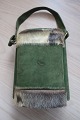 Vintage handbag with a fur coat as trimming