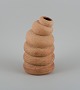 Christina Muff, dansk samtidskeramiker (f. 1971).
Tall organically shaped vessel made from stoneware clay. The sculpture is one 
of a kind.