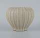 Arne Bang, ceramic vase in grooved design with sand-coloured glaze.
Model No. 3
1940/50s.