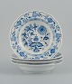 Meissen, a set of four deep plates, hand painted,Blue Onion.