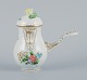 Herend, small chocolate jug with handle hand-painted with flowers. Yellow rose 
in relief on the lid.