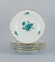 Meissen, Germany, a set of six "Neu Marseille" dinner plates hand painted with 
green flowers and gold trim.