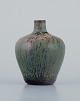 Carl-Harry Ståhlane for Rörstrand, miniature ceramic vase.
Glaze in shades of blue and green.