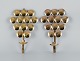 Kee Mora, Sweden, a pair of brass wall sconces, Swedish design.
1960s/70s.