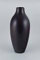 Carl Harry Stålhane for Rörstrand, colossal ceramic floor vase with glaze in 
brown tones.