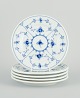 Five Royal Copenhagen Blue Fluted Plain plates in hand-painted porcelain.