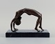 Unknown sculptor, Art Deco bronze figure of a nude woman on marble base.
