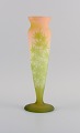 Tall Émile Gallé vase in frosted art glass decorated with green thistles.