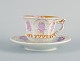 Antique Meissen style chocolate cup.
Hand painted in pink and with gold decoration, richly ornamented.
