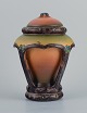 Ipsens, Denmark, beautiful Art Nouveau lid vase with glaze in orange and green 
tones.