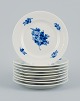 A set of nine Blue Flower Braided cake plates from Royal Copenhagen.