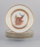 Royal Copenhagen, six  fauna danica style dinner plates hand painted with animal 
motifs.
Decorated with gold rim.
