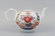 Meissen, antique teapot with colorful floral decorations and gold.