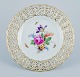 Meissen, Germany, openwork plate hand painted with flowers and butterflies.