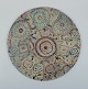 Royal Copenhagen, eight Baca faience tiles with patterned glaze in brown, blue, 
green and sand colours.