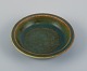 Eva Stæhr Nielsen for Saxbo, small ceramic bowl with glaze in green, blue and 
brown tones.