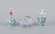 Herend, Ungarn, tre dele porcelæn, bestående af lågbojan, lille vase og 
æggeformet lågkrukke, håndmalet med blomster og fugle.