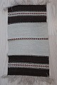 An old table cloth handwoven
Made of wool
In a good condition