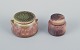 Carl Harry Stålhane for Rörstrand, two miniature lidded jars in ceramic with 
glaze in brownish-green tones.