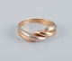 18 karat gold ring in a modernist design.