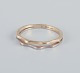 14 karat gold ring in white gold and rose gold. Modernist design.