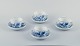 Meissen, Germany, four pairs of Blue Onion coffee cups with saucers. 
Hand-painted.