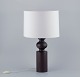 Swedish design, table lamp in wood with white shade.
Approximately from the 1970s/1980s.