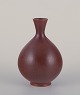 Berndt Friberg for Gustavsberg, Sweden. Ceramic vase with brown glaze. Bulbous 
shape.