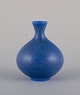 Berndt Friberg for Gustavsberg, Sweden. Ceramic vase with blue glaze. Bulbous 
shape.