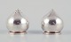Aage Weimar, Danish silversmith. 
A pair of modernist salt and pepper shakers in sterling silver.