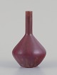 Carl Harry Stålhane (1920-1990) for Rörstrand, Sweden. Ceramic vase with a 
slender neck. Brown-toned glaze.