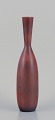 Carl Harry Stålhane (1920-1990) for Rörstrand. Large ceramic vase with a slender 
neck. Glaze in brownish tones.