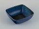Carl Harry Stålhane (1920-1990) for Rörstrand. Large square ceramic bowl with 
glaze in blue and green shades.