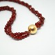 Per Borup; Clasp of 14k gold with necklace of carnelian