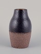 Mari Simmulson for Upsala Ekeby, Sweden. Onyx ceramic vase with glaze in black 
hues. The lower half is unglazed.