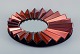 Olivier de Schrijver (1958), French designer. Futuristic "Simba Rouge" unique 
wall mirror made of copper-colored metallic acrylic glass. Faceted mirror.