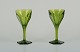 L'Art presents: 
Baccarat, 
France. Two 
Tallyrand green 
white wine 
glasses in 
faceted crystal 
glass.