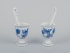 Two Blue Onion 
egg cups with 
spoons.
Hand-painted.