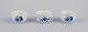 Meissen, Germany. Three small bowls. Hand-decorated with blue floral motifs, 
gold rim.