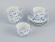 Royal Copenhagen Blue Fluted Plain, four coffee cups with saucers. Rare cup in 
an extra-large size.