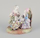 Meissen, Tyskland.
Large and impressive figurine group of three people in fine clothing.