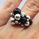 Georg Jensen; A Moonlight Grapes ring of sterling silver set with onyx